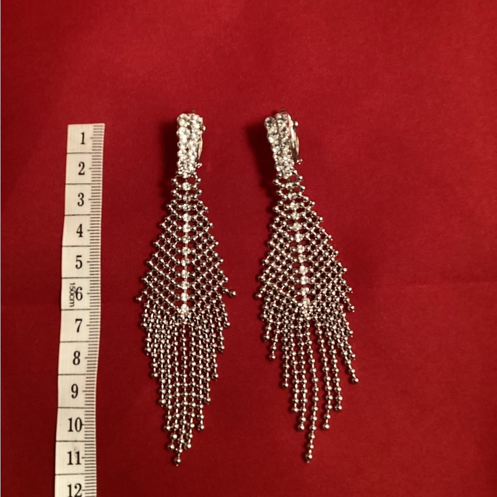 Long silver tone dangle clip on earrings